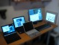 several computers on a desk